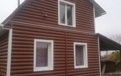 Отделка фасада сайдингом Альта-Профиль блок хаус (Blockhouse)