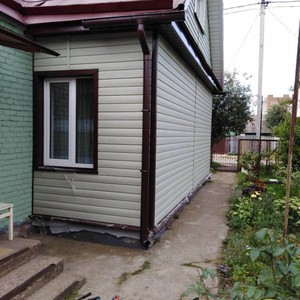 Монтаж винилового сайдинга Тимберблок Ясень Прованс зеленый