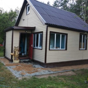 Монтаж цокольного сайдинга Vox SOLID Stone Regular Umbria и отделка фасада сайдингом Тимберблок Ясень золотистый