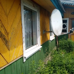 Отделка фасада сайдингом Stone House Кирпич песочный
