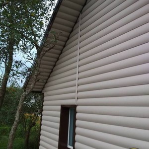 Отделка фасада панелями Альта-Профиль двухпереломный Персиковый