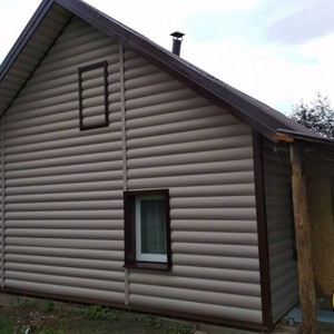 Отделка фасада панелями Альта-Профиль двухпереломный Персиковый