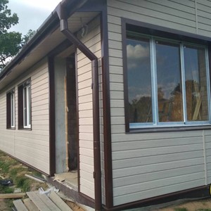 Отделка фасада панелями Vox Max 3 Ясень