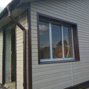 Отделка фасада панелями Vox Max 3 Ясень