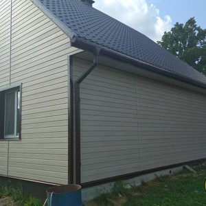 Отделка фасада панелями Vox Max 3 Ясень