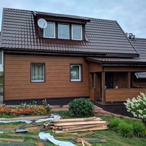 Отделка фасада панелями Vox Max 3 дуб золотой 150 м²