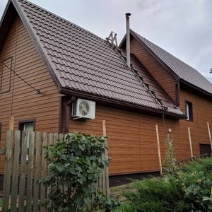 Отделка фасада панелями Vox Max 3 дуб золотой 150 м²