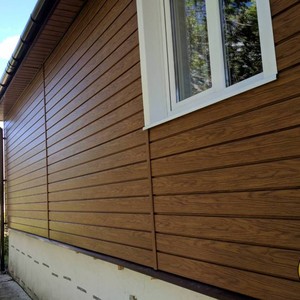 Отделка фасада панелями Vox Max 3 дуб золотой 120 м²