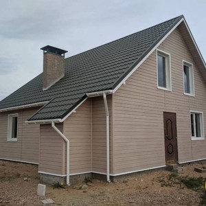 Отделка фасада сайдингом Vox Max 3 Ясень