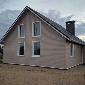 Отделка фасада сайдингом Vox Max 3 Ясень