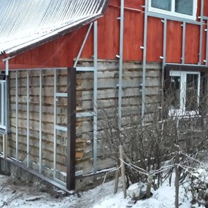 Отделка фасада панелями Альта-Профиль BH-3 золотистый