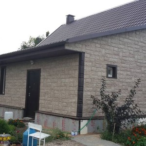 Отделка фасада панелями Альта-Профиль Скалистый камень Алтай