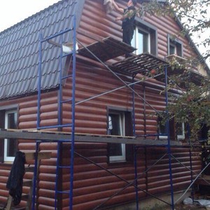 Отделка фасада металлическим сайдингом Альтер Стрим