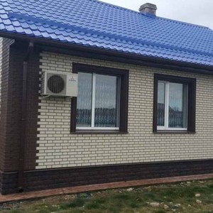Отделка фасада панелями Альта-Профиль Кирпич клинкерный Белый