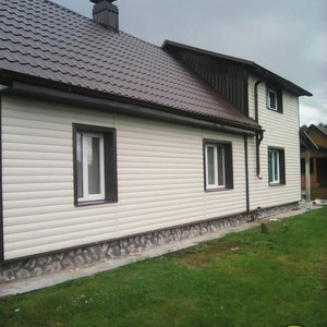 Отделка фасада панелями Блок Хаус (Blockhouse) Docke Сливки