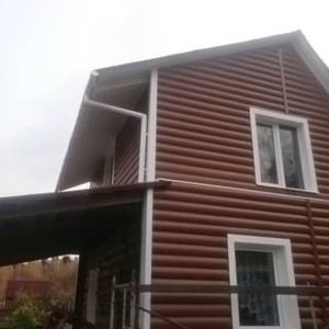 Отделка фасада сайдингом Альта-Профиль блок хаус (Blockhouse)