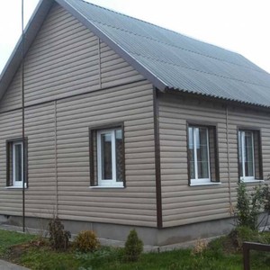 Отделка фасада сайдингом Тимберблок Дуб натуральный