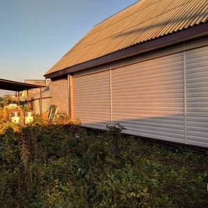 Отделка фасада сайдингом Тимберблок Ясень белый