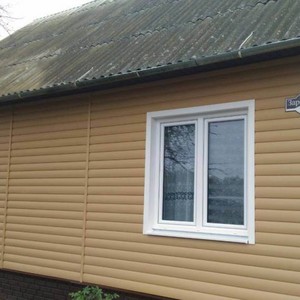 Отделка фасада 140 м2 сайдингом Блок Хаус (Blockhouse) Docke Карамель