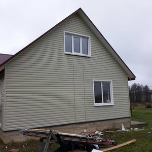 Отделка фасада панелями Doсke D4.5 Корабельный брус Халва