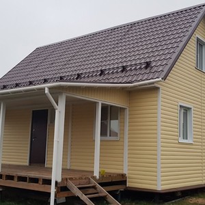 Отделка фасада сайдингом Альта-Профиль BH3 малый двухпереломный золотистый 120м2