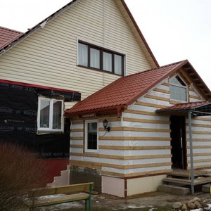Отделка фасада панелями Альта-Профиль Гранит Уральский