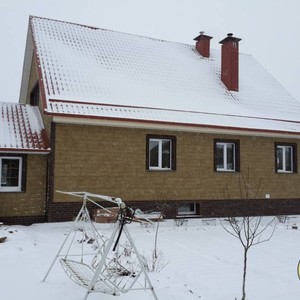 Отделка фасада панелями Альта-Профиль Гранит Уральский
