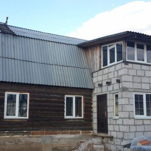 Отделка фасада панелями Альта-Сайдинг Розовый