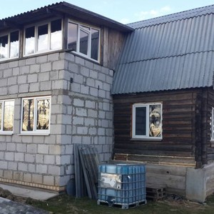 Отделка фасада панелями Альта-Сайдинг Розовый